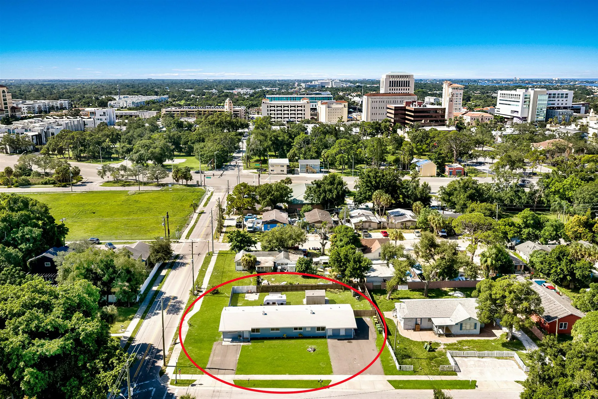 Aerial view of 431 N East Avenue outlined in red with downtown Sarasota beyond